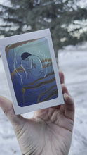 Load and play video in Gallery viewer, Rotation of the Gentle Tarot Linen Edition box, designed with colorful rainbows and the classic Two of Thunder artwork on the cover. Snow and trees in the background. 
